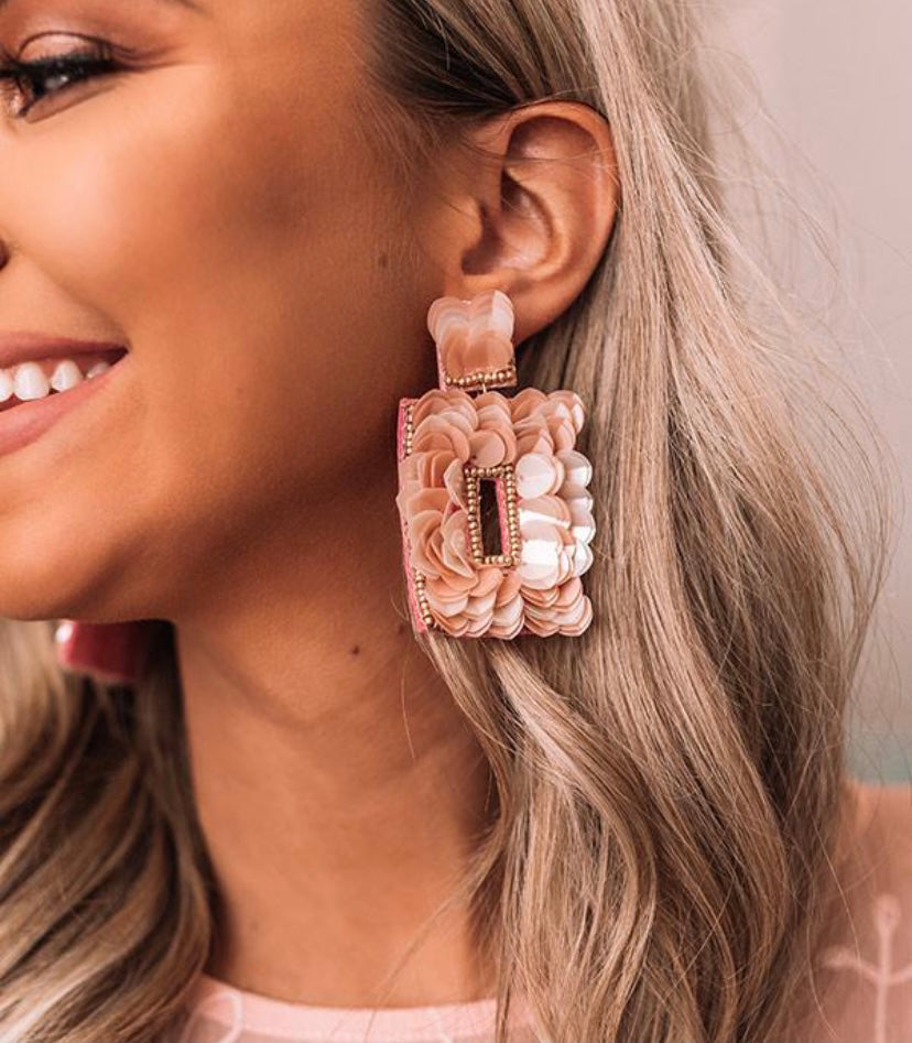 Flirty statement earrings